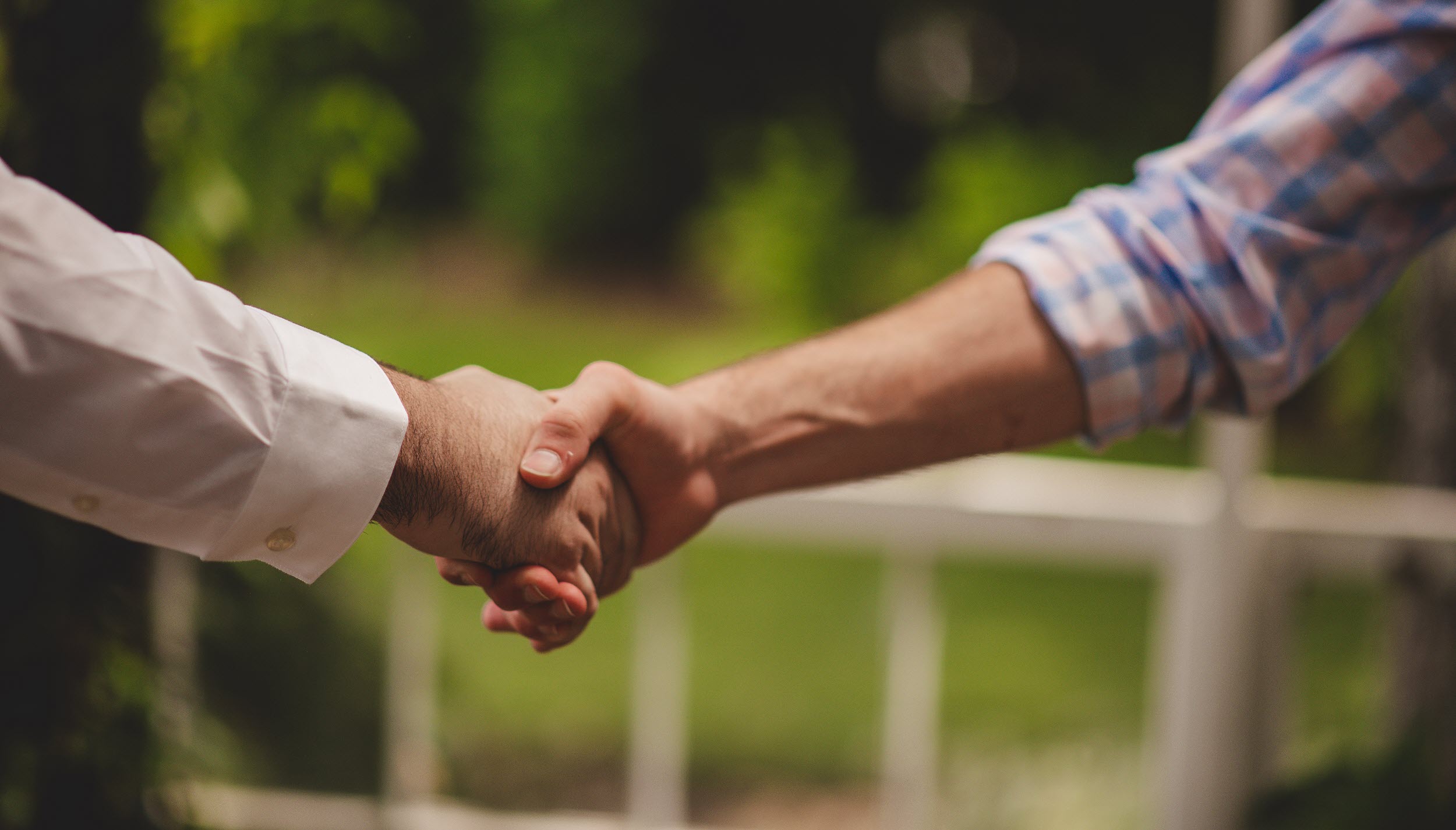 Two people shaking hands